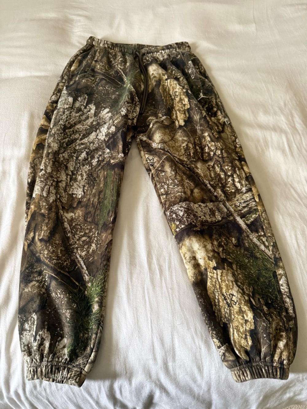 Air Jordan woodland print joggers.